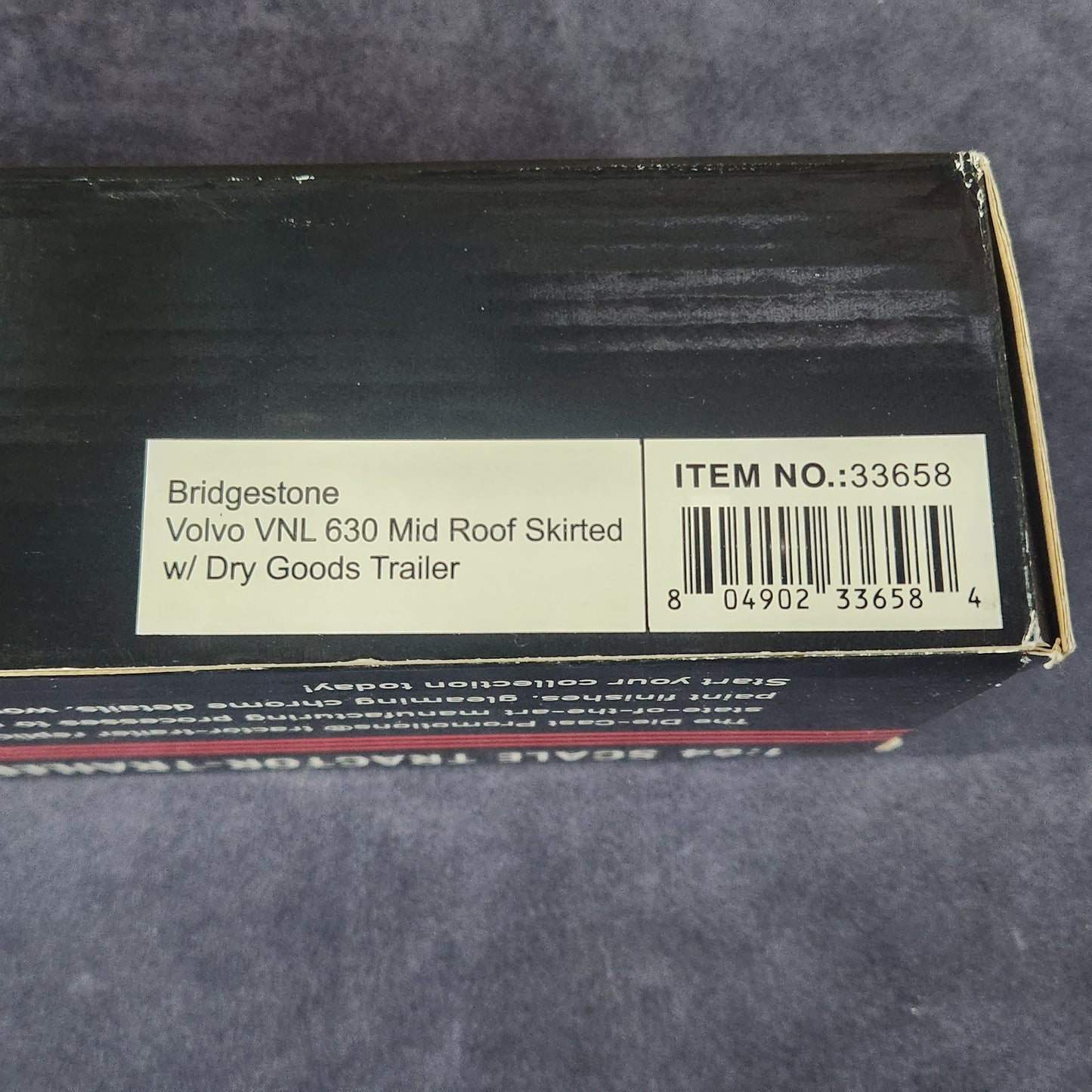 Diecast Promotions 1:64 Bridgestone Volvo VNL 630 Mid Roof with Dry Goods Trailer DCP #33658