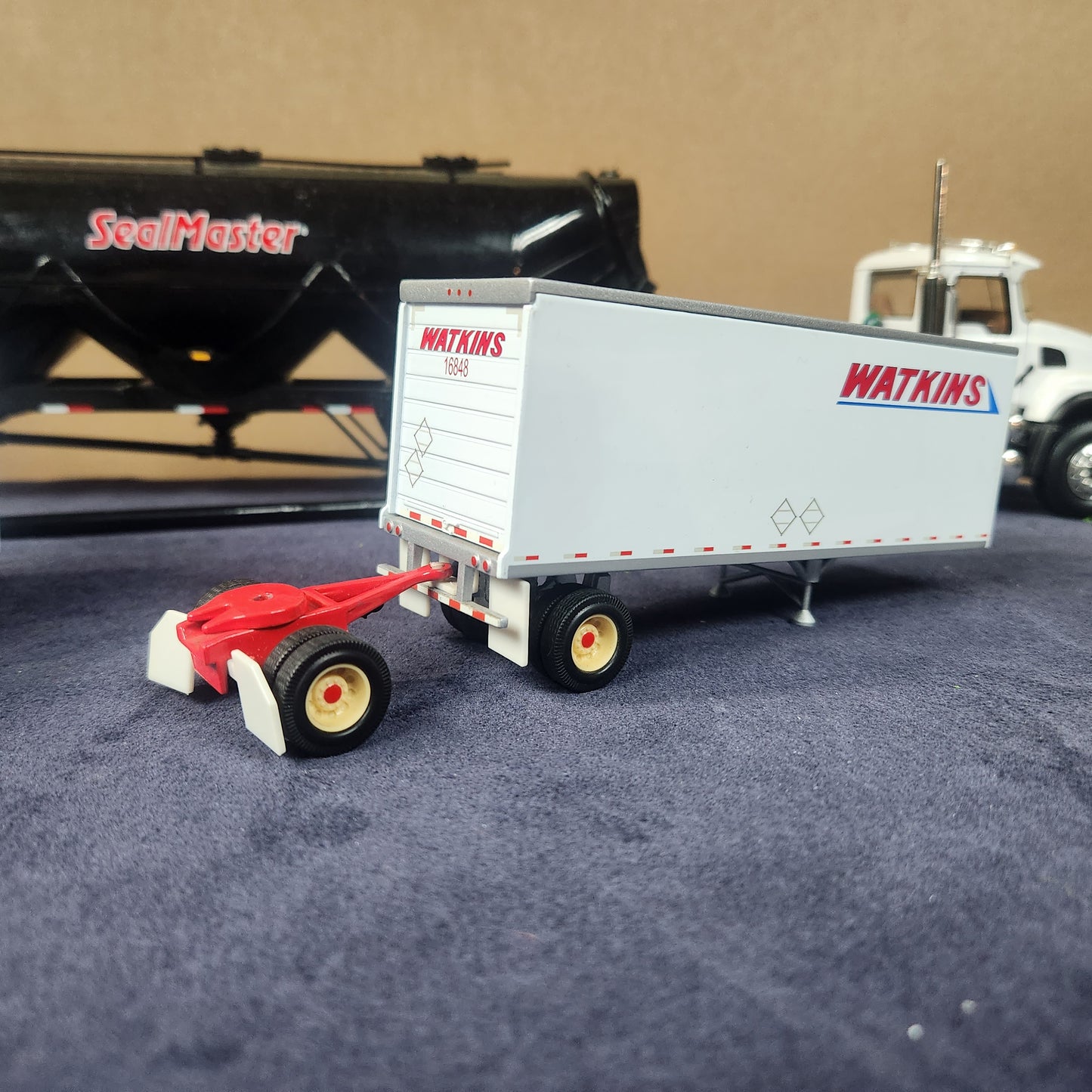 PEM 1:64 Watkins Volvo Single Axle Sleeper Tractor with Dual Pup Trailers and Dolly