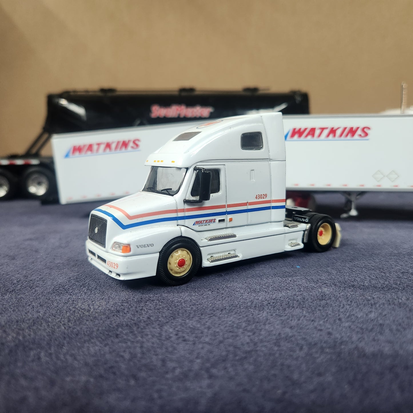 PEM 1:64 Watkins Volvo Single Axle Sleeper Tractor with Dual Pup Trailers and Dolly