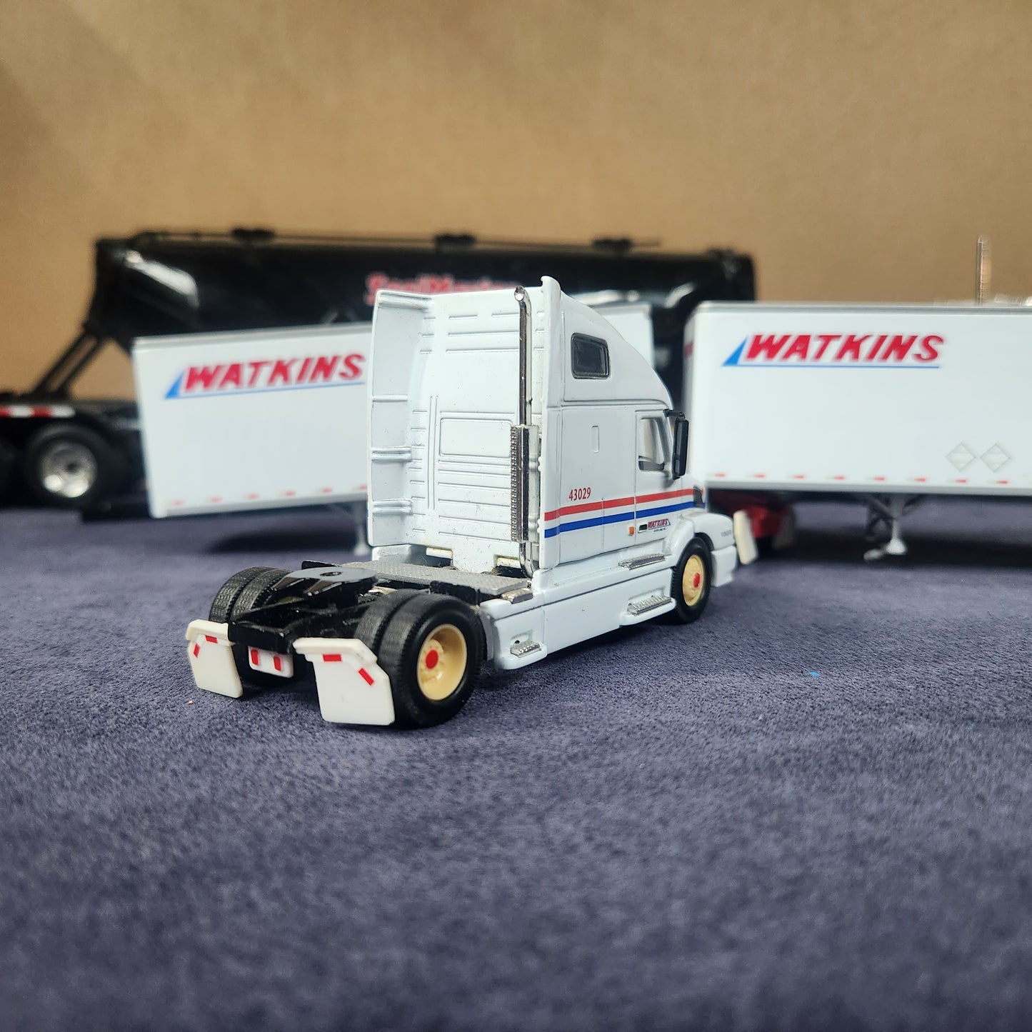 PEM 1:64 Watkins Volvo Single Axle Sleeper Tractor with Dual Pup Trailers and Dolly