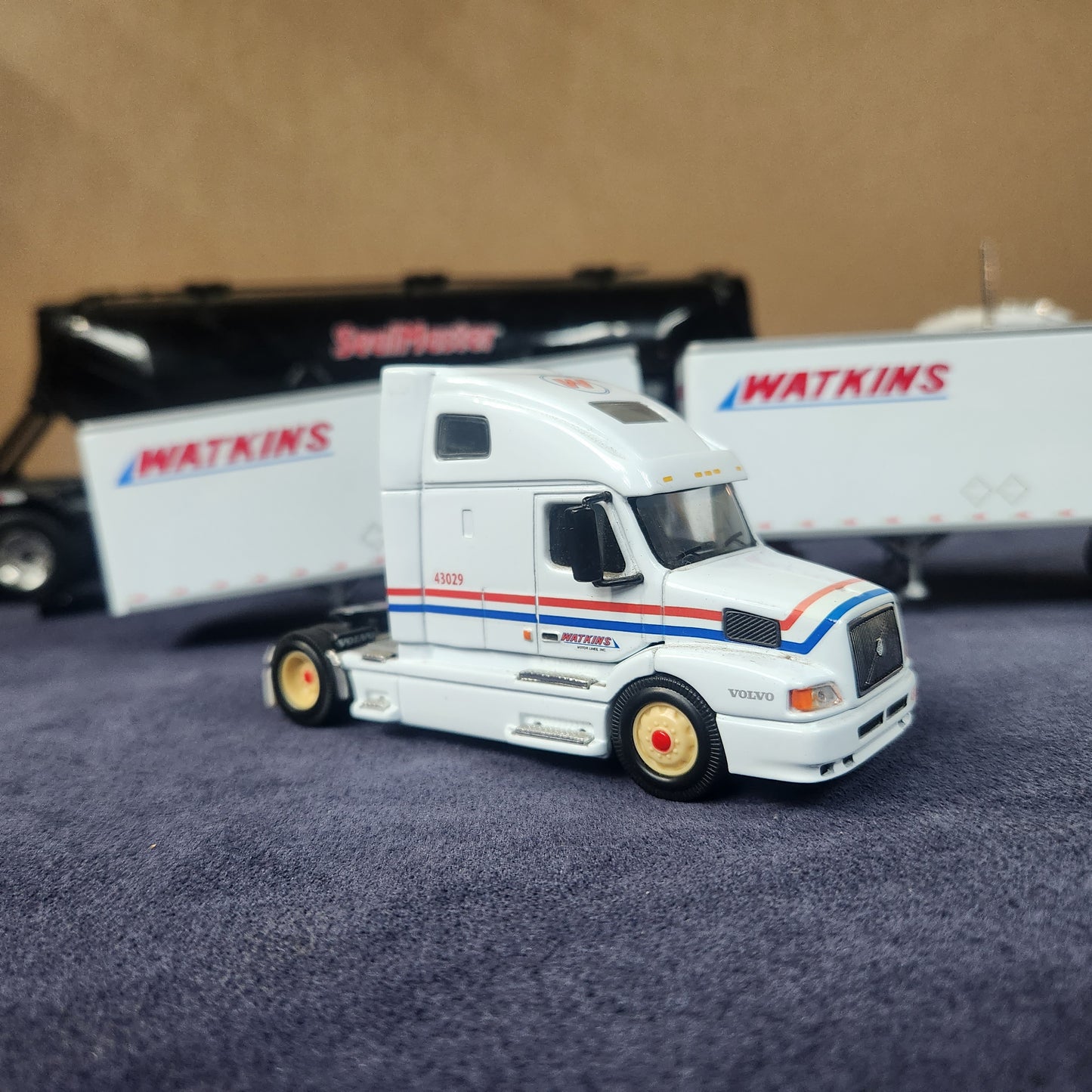 PEM 1:64 Watkins Volvo Single Axle Sleeper Tractor with Dual Pup Trailers and Dolly