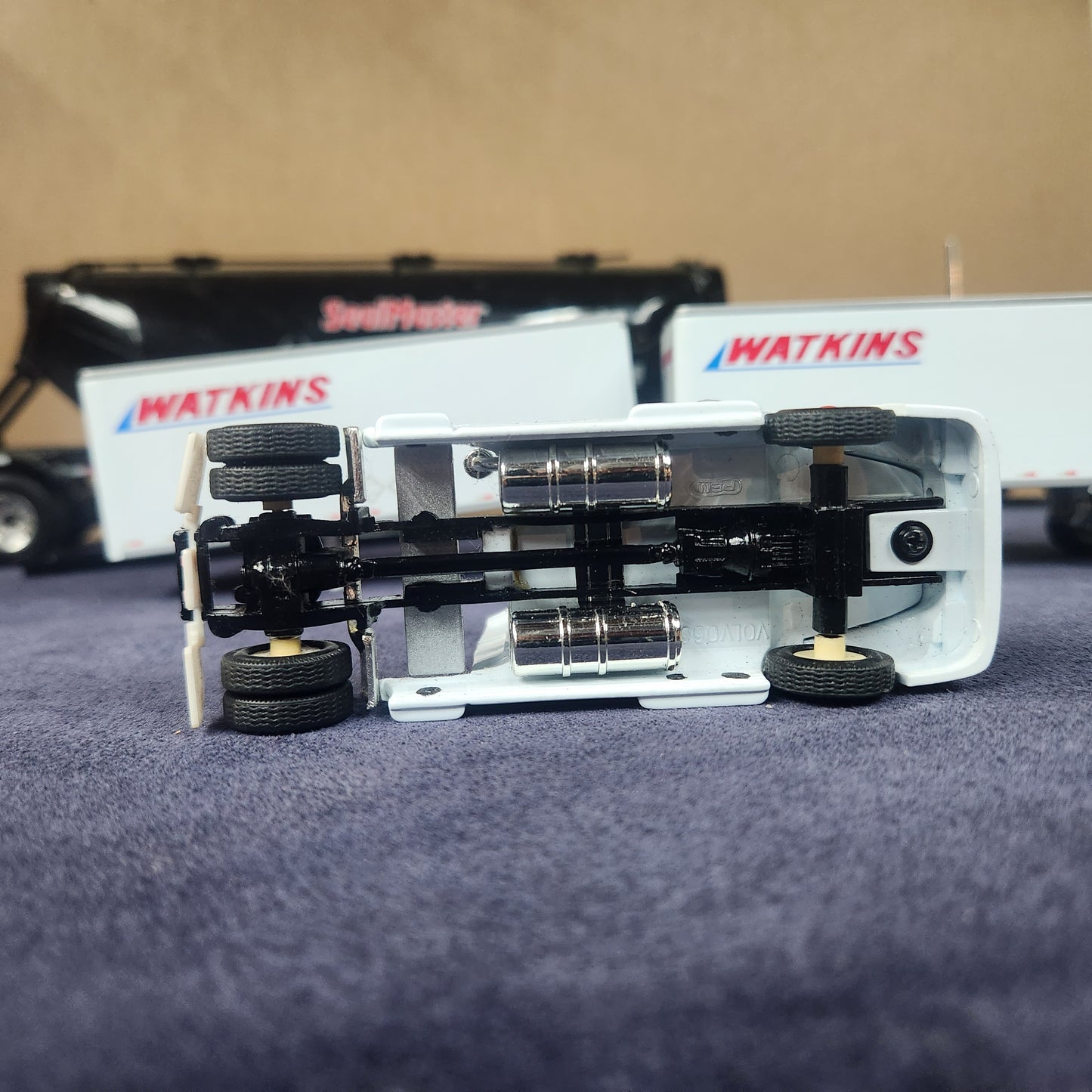 PEM 1:64 Watkins Volvo Single Axle Sleeper Tractor with Dual Pup Trailers and Dolly